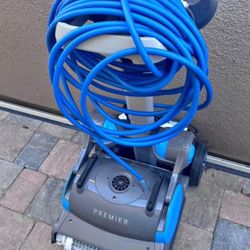 Dolphin Premier pool cleaner and cart 600$