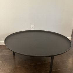 Black round west elm coffee table