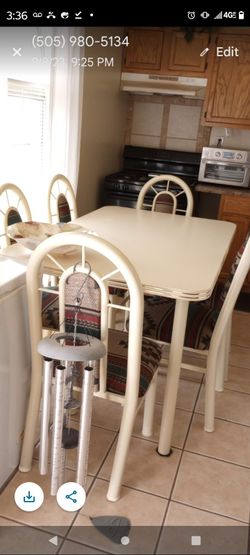 Dinning Table with Southwestern style pattern on   chairs