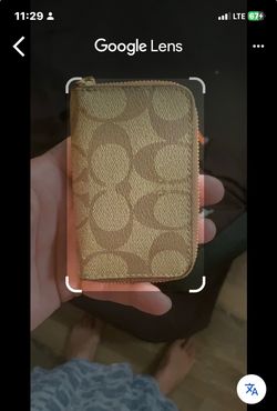Coach Signature Zip-Around Mini Wallet