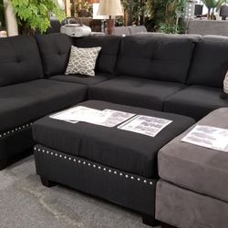 Brand New 104" x 75" Black Fabric Reversible Sectional + Ottoman
