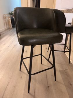 2 green bar stools