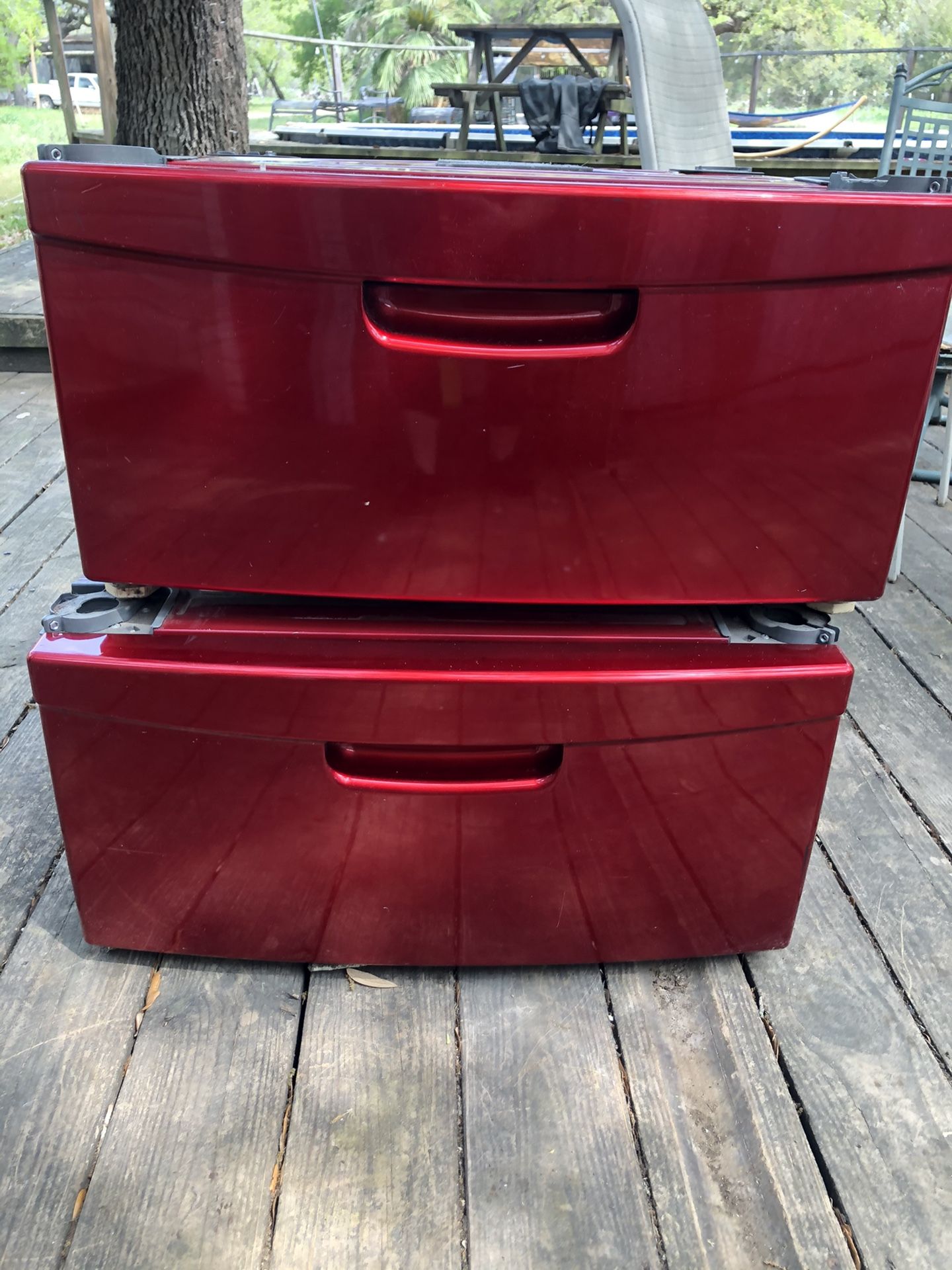 Red front load washer/dryer pedestals