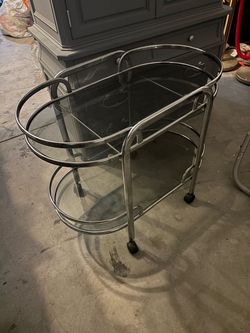 Glass coffee table with wheels