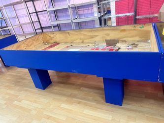 Large wood tables for bin store