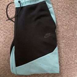 Teal nike tech bottom 