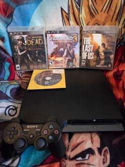 Sony Playstation 3 Slim Console with 4 Games