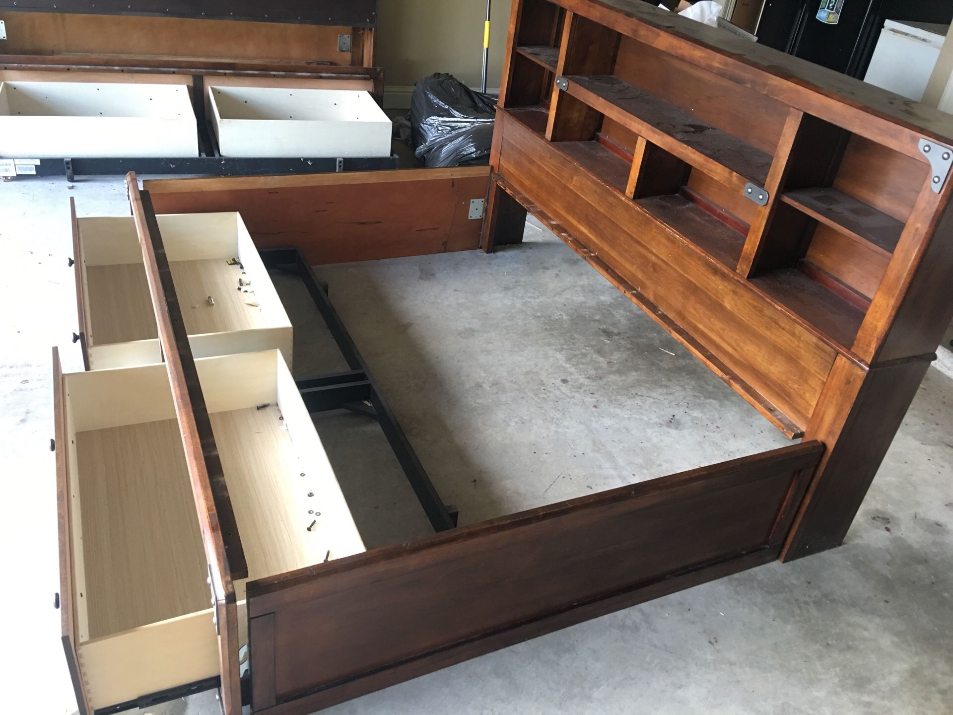 Full bed with storage drawers underneath and headboard shelves fits a full size mattress