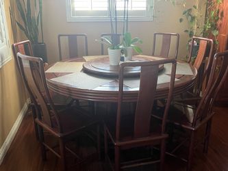 Free round dining table with 8 chairs.