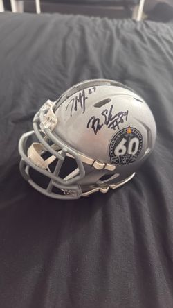 Signed Raider mini helmet