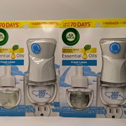 2 Air Wick Essential Oils Fresh Linen Wall Plug in, White