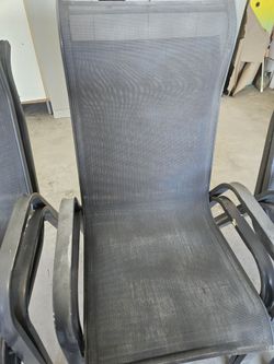 Outside Grey chairs