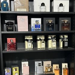 A bunch of perfumes and colognes