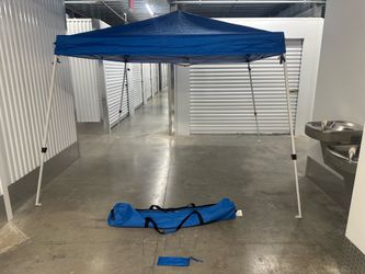Canopy tent shelter 10 by 10  ajustable heights like new ready to use $55