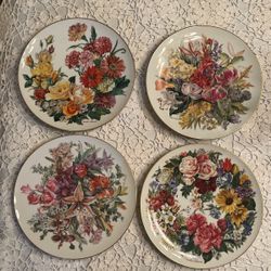 Set of four German floral art plates by artist Ursula Band