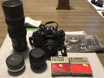 Canon A-1 w/50mm Lens Plus Extras