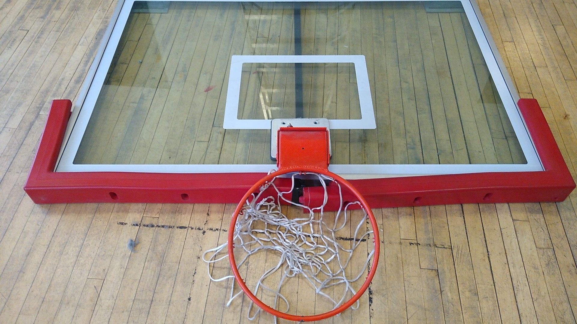 NBA glass backboard and basketball hoop