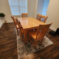 Solid Wood Dining Table With 6 Chairs. Hidden Leaf