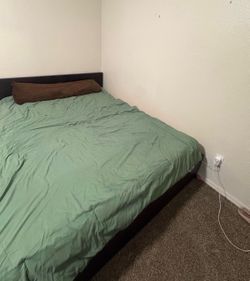 Queen bed with mattress and frame