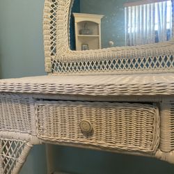 White wicker vanity with matching stool and mirror