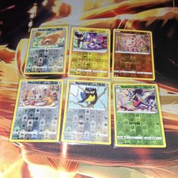 POKEMON RANDOM LOT OF BASIC COMMON REVERSE HOLO CARDS...VG CONDITION...ADULT OWNED AND KEPT IN A SMOKE FREE HOME...$1 EACH