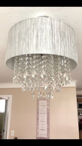 Chandelier Light( great condition). 4 bulbs , 48 clear hanging crystals.