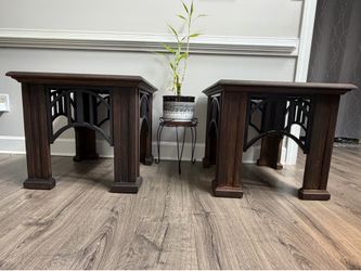 Pair of dark wood end tables with slate tile tops