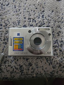 Sony Cyber-shot DSC-W30 digital camera featuring a 6.0-megapixel Carl Zeiss lens.