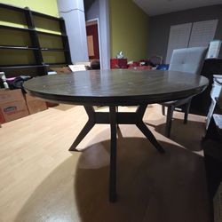 Free 48” Round Dining Table + 2 Chairs