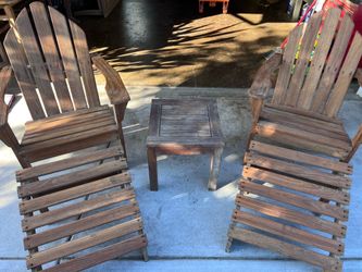 Set of 2 Teak Adirondack chairs with footrests and side table (made by smith and hawken)  Located in concord  Recently cleaned, sanded and teak oiled 