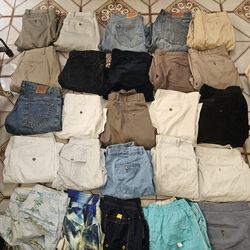 50 used mens brand name pants shorts..size 36x30