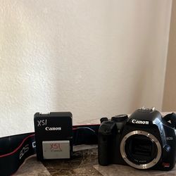 Canon EOS Rebel XSi DSLR camera (Body Only)  – Includes Battery & Charger