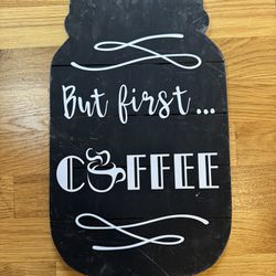 “But first coffee” sign 