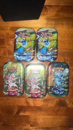 Pokemon Prismatic Evolutions mini tins