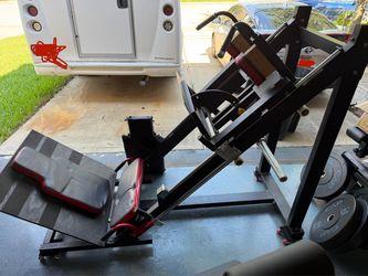 Plate loaded hack squat and leg press machine