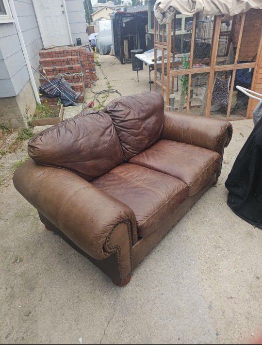 Matching leather sofa and love seat $75