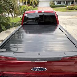 RetraxPRO MX Aluminum, Black Retractable Truck Bed Cover 