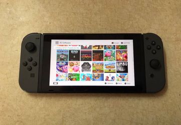 Nintendo Switch V2 with 100 Switch Games + 7000 Retro Games