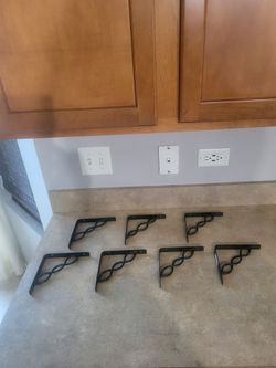 Decorative shelf brackets 6in., black. (Sold as a set of 7)
