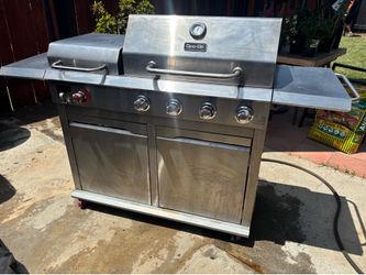 Dyna Glo 4-Burner Propane Gas Grill in Stainless Steel with Griddle