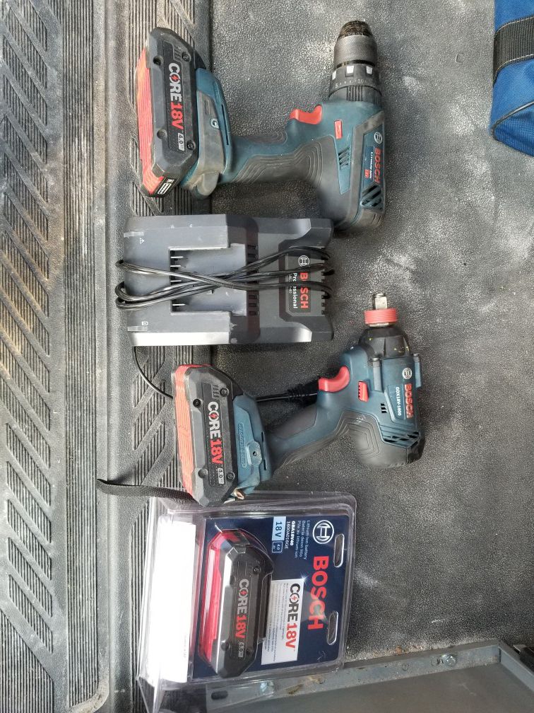 Bosch impact and hammer drill .3 batts.1 charger.