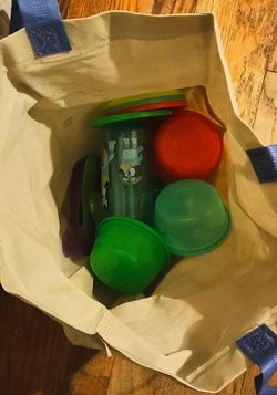 Bag of baby feeding items