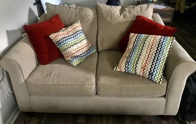 Two beige couches