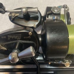 Have 2 auntie Garcia Michael 300 Fishing Reels And Shakespeare Rod