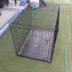 Large metal kennel has bottom try is a little bent on door but have a clip to hold it asking $45 cas