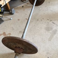 Straight Bar With 50 Lbs Of Weight 