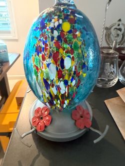Glass hummingbird feeder