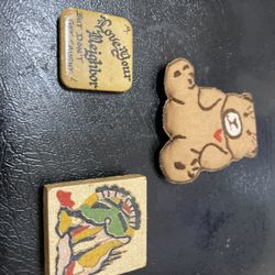 Various fridge magnets bear,Navajo, love thy neighbor