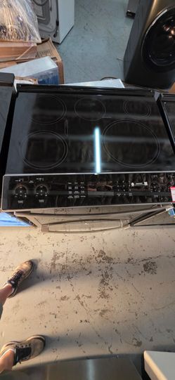 NEW GE PROFILE INDUCTION RANGE SLIDE IN STAINLESS STEEL