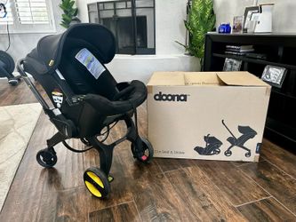 Doona (stroller, base, and travel bag)
